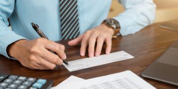 Should paper checks be abolished like the penny?